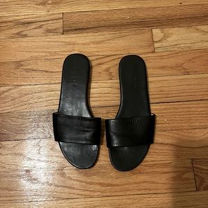 Nisolo black one strap sandals